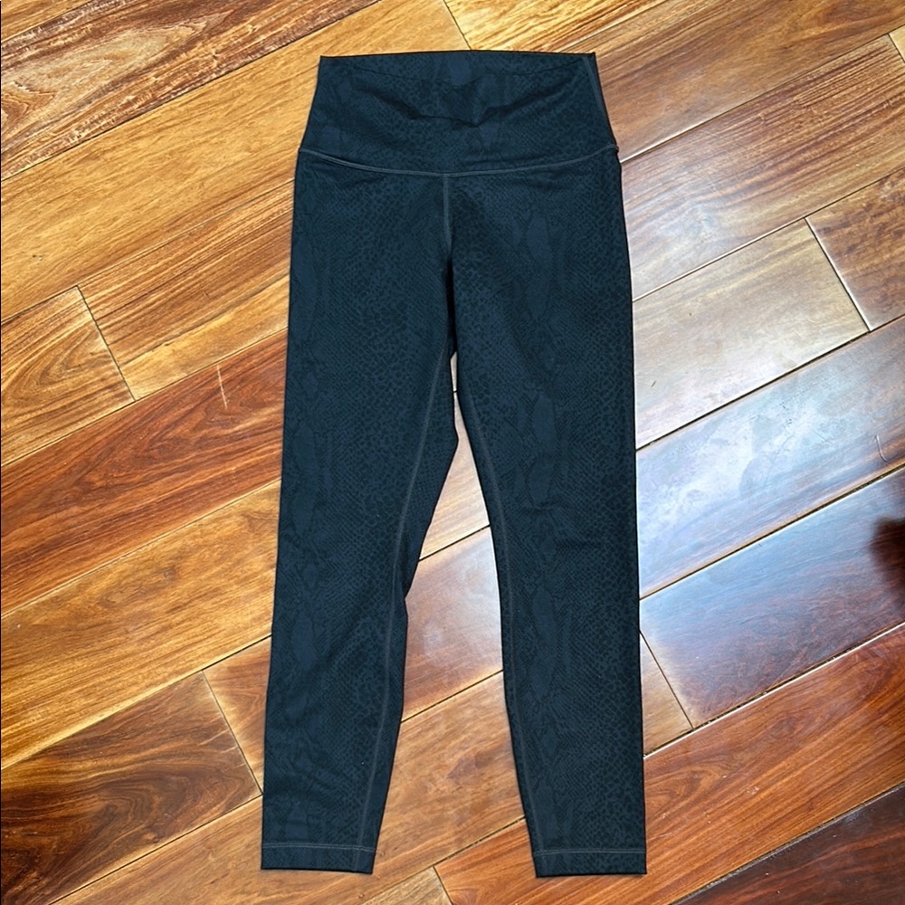 Black snakeskin lululemon size 6 Patterned Leggings